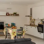 Tra Gli Ulivi -